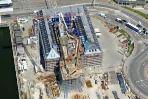 Maison du Port d'Anvers, Havenhuis Antwerpen, Suezdok - Chantier en Juillet 2014. Zaha Hadid Architects