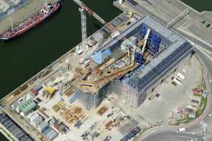 Maison du Port d'Anvers, Havenhuis Antwerpen, Suezdok - Chantier en Juillet 2014. Zaha Hadid Architects