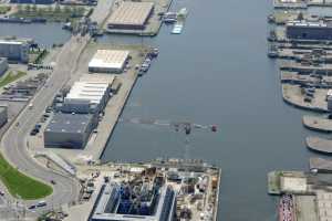 Maison du Port d'Anvers, Havenhuis Antwerpen, Suezdok - Chantier en Juillet 2014. Zaha Hadid Architects