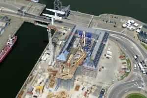 Maison du Port d'Anvers, Havenhuis Antwerpen, Suezdok - Chantier en Juillet 2014. Zaha Hadid Architects