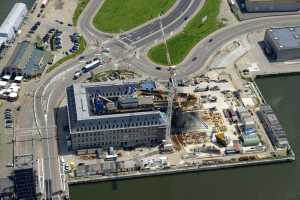 Maison du Port d'Anvers, Havenhuis Antwerpen, Suezdok - Chantier en Juillet 2014. Zaha Hadid Architects