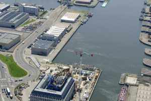 Maison du Port d'Anvers, Havenhuis Antwerpen, Suezdok - Chantier en Juillet 2014. Zaha Hadid Architects